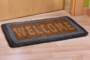 Welcome Mat outside door in TAC colors