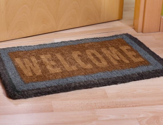 Welcome Mat outside door in TAC colors